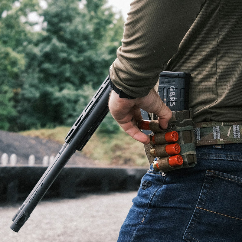 GBRS Group Shotgun Shell Sleeve in use during live fire shotgun training at the range showing fast shell access from mag pouch mounted reload sleeve