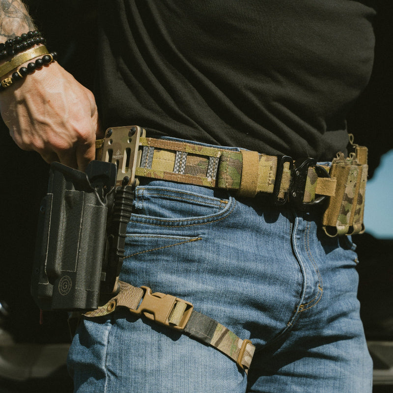 GBRS Group tactical leg strap installed on True North Concepts MHA with duty holster and battle belt during live fire range training, adjustable Tegris reinforced drop holster strap built for draw stability, recoil control, and professional tactical loadouts made in the USA