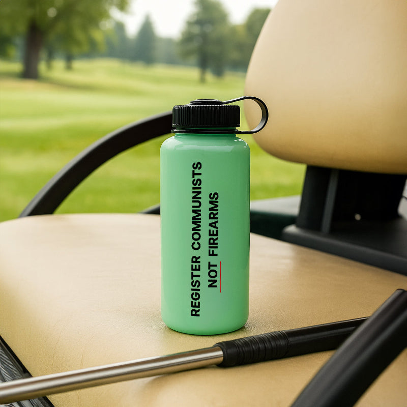 Glow in the dark water bottle with black text on a golf cart seat with a golf course background