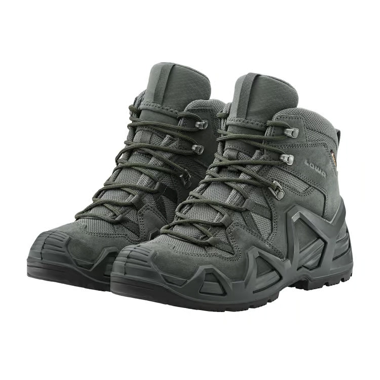 Angled view of a pair of LOWA Zephyr MK2 GTX Mid tactical boots in Wolf showcasing the supportive MONOWRAP frame and rugged outsole.