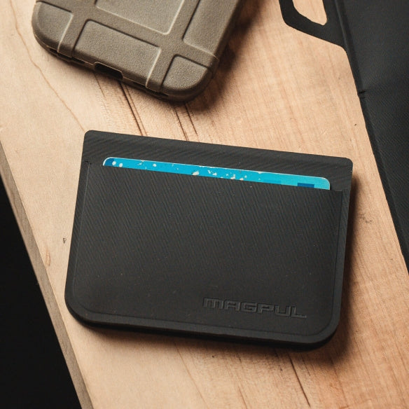 Magpul DAKA Everyday Folding Wallet flat lay view highlighting ultra slim folding design and low bulk everyday carry profile that minimizes pocket printing