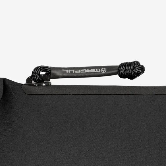 Magpul DAKA Pouch Small Black close up of YKK AquaGuard water resistant zipper and 550 paracord heat shrink pull for glove friendly access
