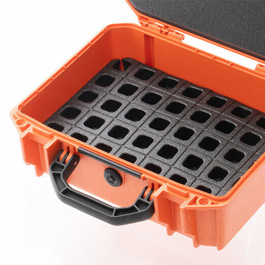 Magpul DAKA Universal GRID Organizer Rifle Kit trimmed and installed inside compact hard rifle case securing firearm optics and accessories using modular compression block system