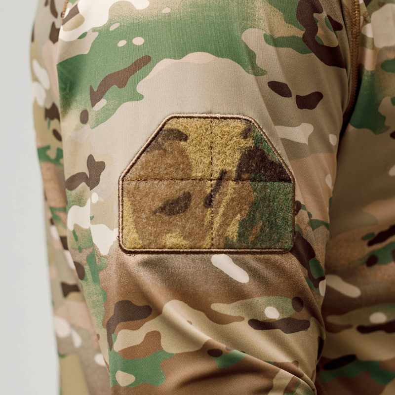 Close-up of the opposite bicep loop patch panel on the MultiCam tactical shooter shirt, ideal for symmetrical patch placement or team ID tags