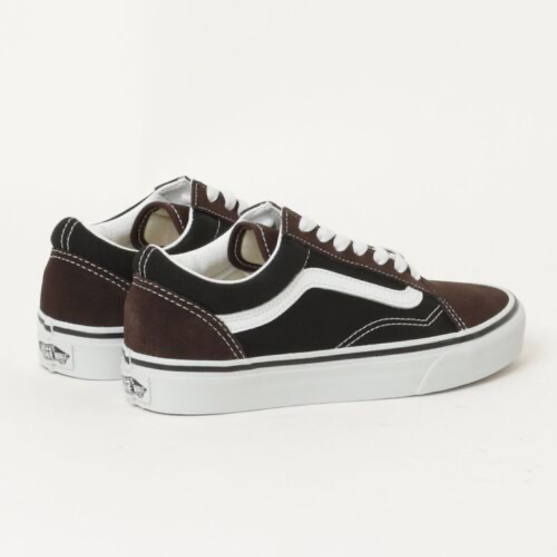Angled view of Vans Old Skool brown and black suede canvas skate shoe highlighting vulcanized construction and padded collar
