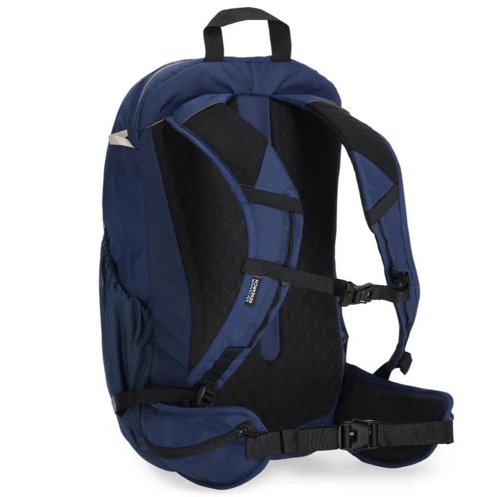 Back view of the Outdoor Research Adrenaline Day Pack 30L in Cenote navy blue, showing padded ergonomic shoulder straps, ventilated back panel, hip belt with storage pockets, and adjustable sternum strap for secure alpine and hiking carry.