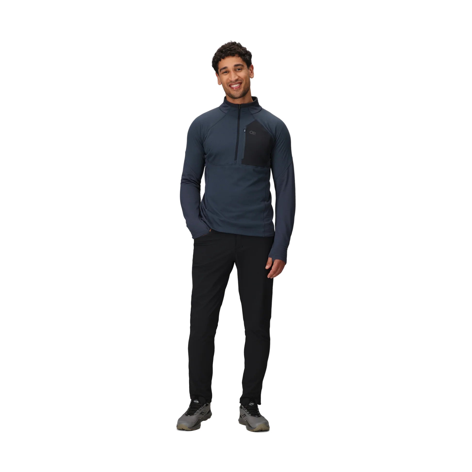 Full body view of the Outdoor Research Deviator Fleece Half Zip in Atlantic deep navy, shown on a model with athletic fit, hybrid construction, and technical midlayer design for alpine and cold-weather missions.