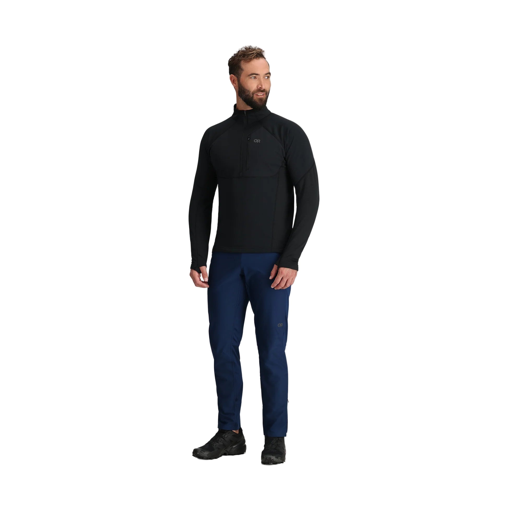 Full body view of the Outdoor Research Deviator Fleece Half Zip in black, shown on a model with athletic fit, breathable construction, and streamlined midlayer design for alpine and cold-weather missions.