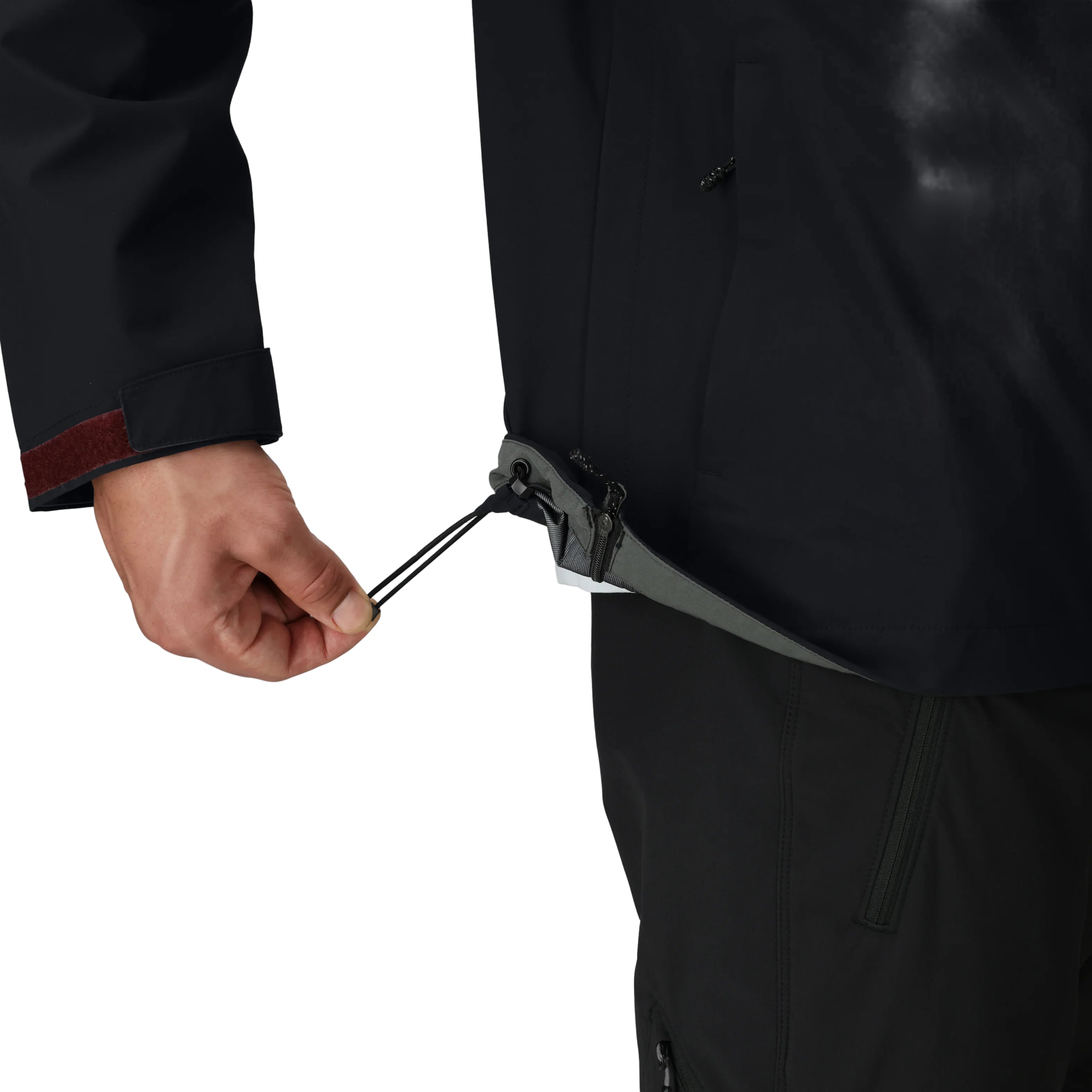 Outdoor Research Foray 3L Rain Jacket detail showing adjustable drawcord hem cinched for a snug fit that reduces excess fabric and seals out weather | Lightweight breathable 3 layer waterproof hiking shell with AscentShell Dry membrane TorsoFlo side vents and recycled nylon — best rain jacket with cinch hem for trekking climbing and outdoor use