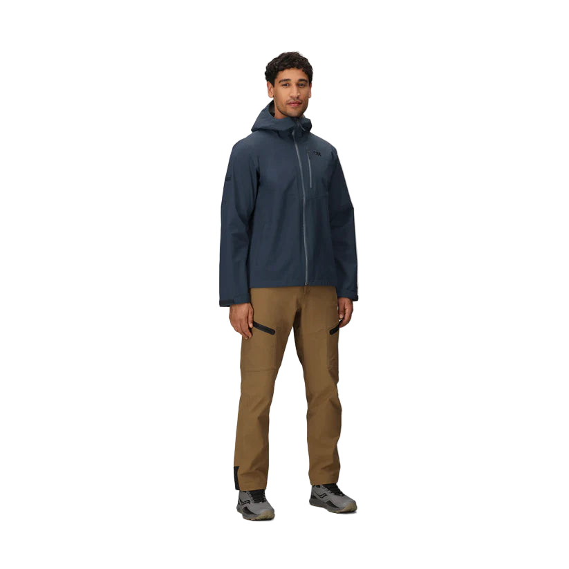 Outdoor Research Foray 3L Rain Jacket in Atlantic deep blue full body shot on model | Lightweight 3 layer waterproof breathable hiking shell with AscentShell Dry membrane TorsoFlo side vents and recycled nylon — best sustainable rain jacket for backpacking mountaineering and wet weather outdoor use