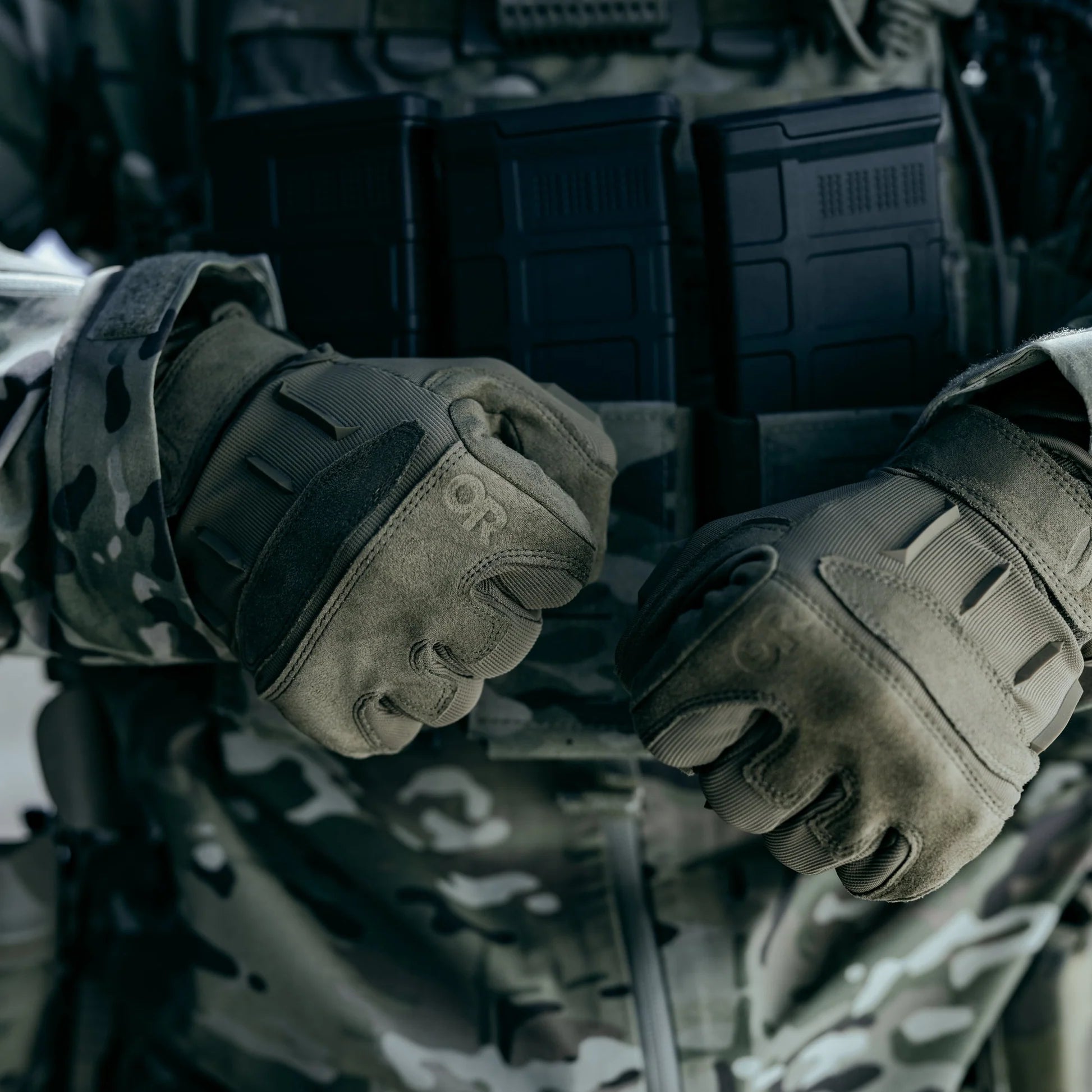 Ranger Green Outdoor Research Ironsight II Gloves worn with full duty uniform and kit, demonstrating secure grip, mobility, and professional-grade durability for law enforcement and military field operations. SEO optimized for tactical duty gloves, range gloves, and professional EDC glove searches.