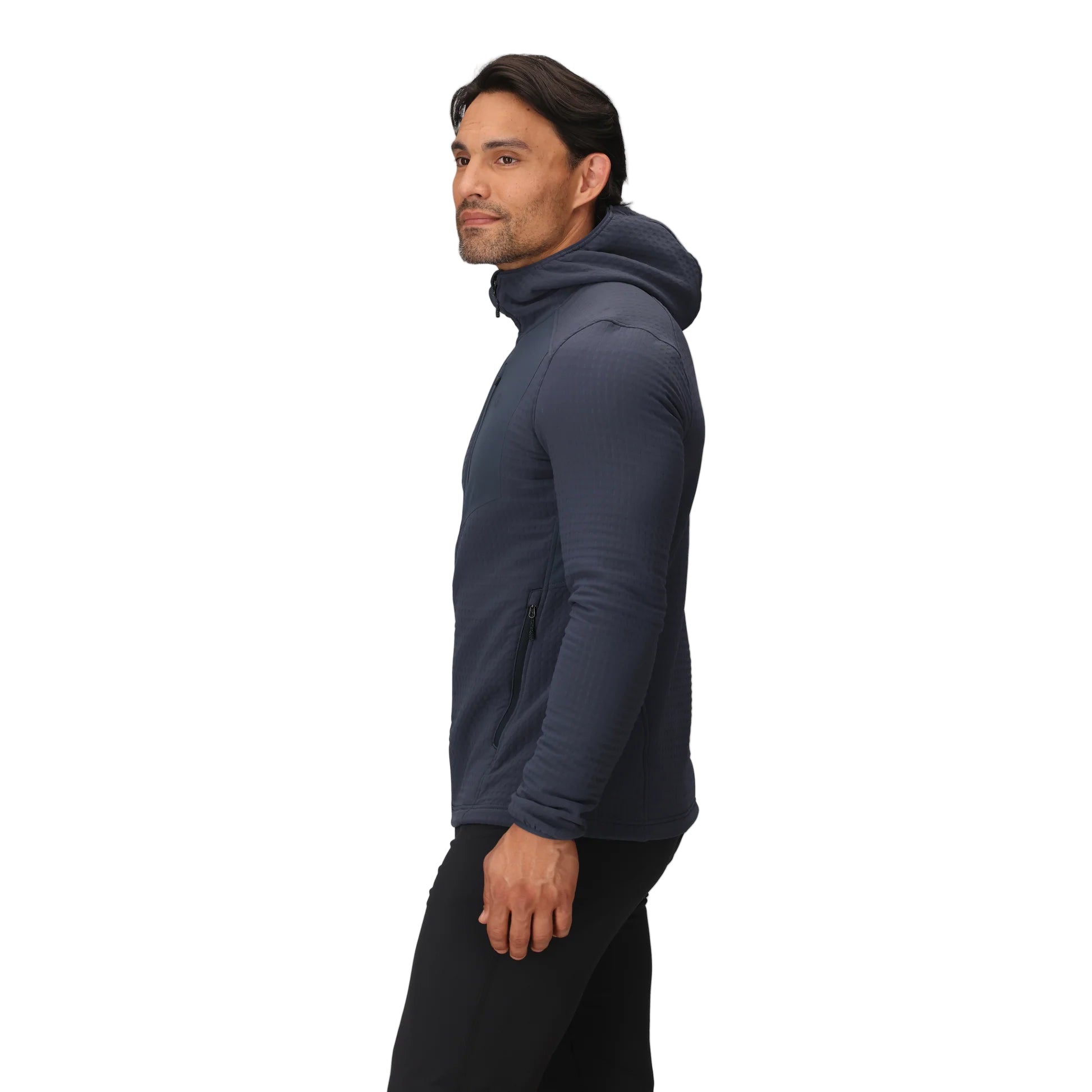 Side view of the Outdoor Research Vigor Plus Fleece Hoodie in Atlantic deep blue, shown on a model to highlight athletic fit, stretch side panels, and ergonomic hood design built for layering and active cold-weather pursuits.