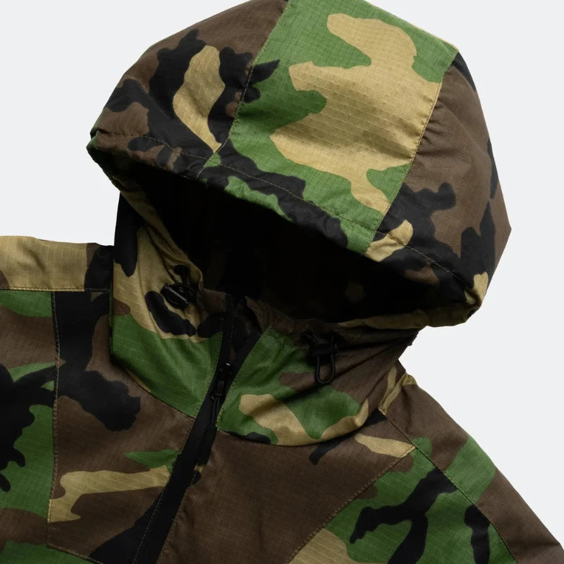 M81 Woodland Camouflage hooded jacket on a white background