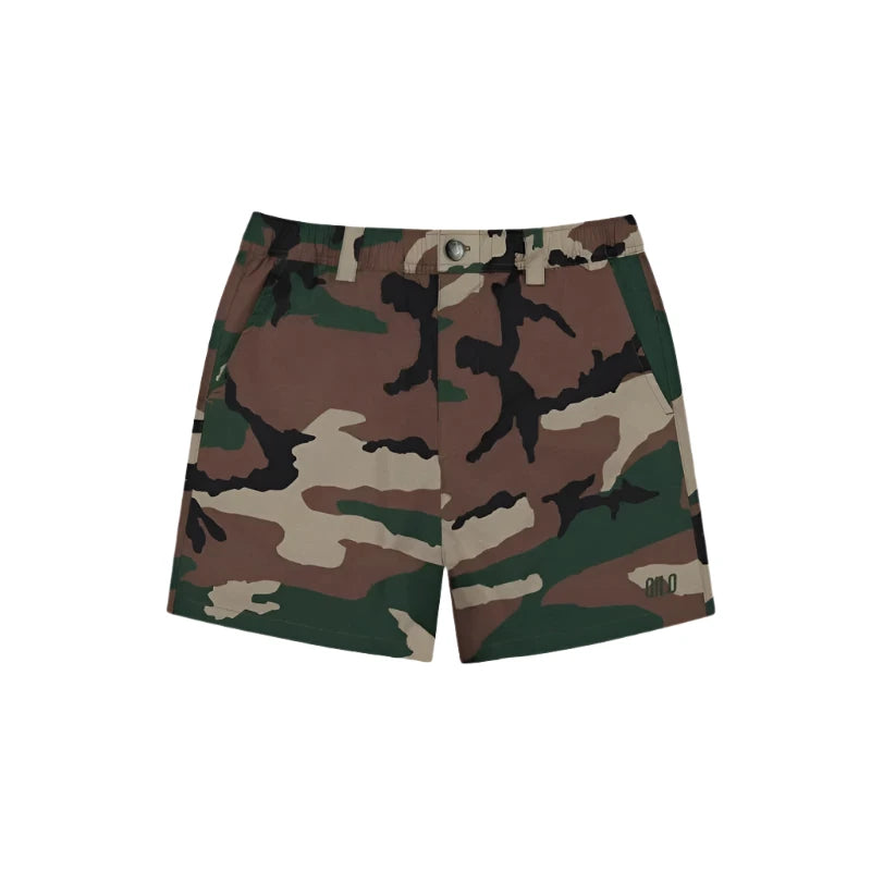 Front view of QILO x WRMFZY EDC Mk. II Shorts in M81 Woodland camo, featuring ripstop stretch fabric and tactical waistband