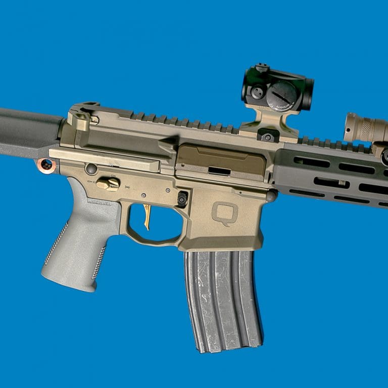 Reptilia DOT Mount shown mounted on a Honey Badger rifle highlighting the secure Picatinny fit, slim 7075 T6 aluminum design, and lower one third co witness setup for Aimpoint T1 and T2 compatible optics.