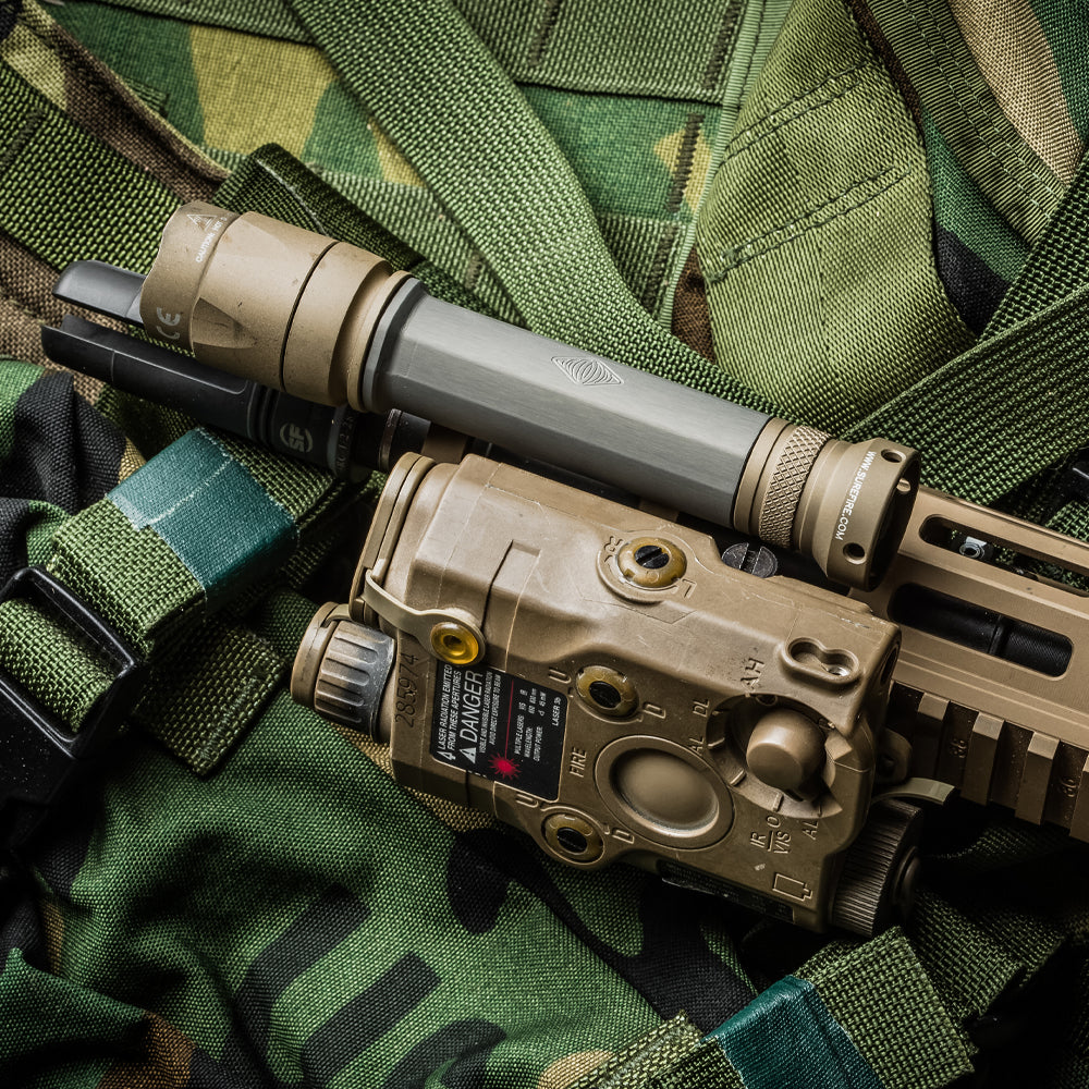 Reptilia TORCH 6V CR123 M-LOK Light Body installed on modern rifle platform configured with laser and weapon light for tactical use