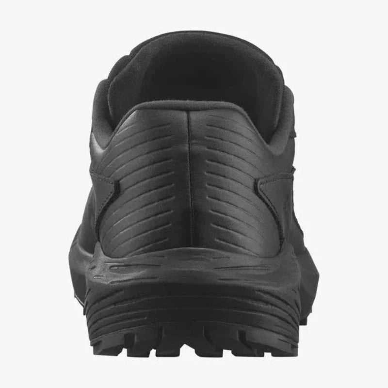 Back heel view of the Salomon Trail Running Shoe in Black Leather showcasing the reinforced heel counter, padded collar, and low-profile tactical design. Built for law enforcement, EMS, and outdoor professionals who need durable, slip-resistant footwear for patrol, training, or trail use. Combines professional polish with rugged all-terrain traction and Quicklace® convenience.