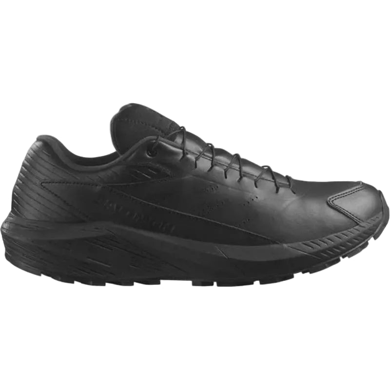 Product shot of the Salomon Trail Running Shoe in Black Leather built for tactical performance, trail running, and law enforcement duty wear. Features a durable leather and textile upper, Quicklace® system for secure fit, and ASTM F3445-rated slip-resistant rubber outsole. Ideal for officers, EMS, and first responders who need all-day comfort and rugged traction in one hybrid tactical shoe.