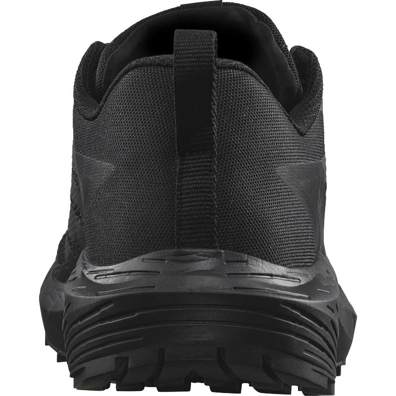 Back heel view of the Salomon Trail Running Shoe in Black highlighting the reinforced heel counter, padded collar, and stability-focused design. Tactical-grade trail running and duty shoe built for law enforcement and EMS professionals. Slip-resistant ASTM F3445-rated outsole delivers traction on slick surfaces and trails alike. Lightweight, durable, and mission-ready footwear.