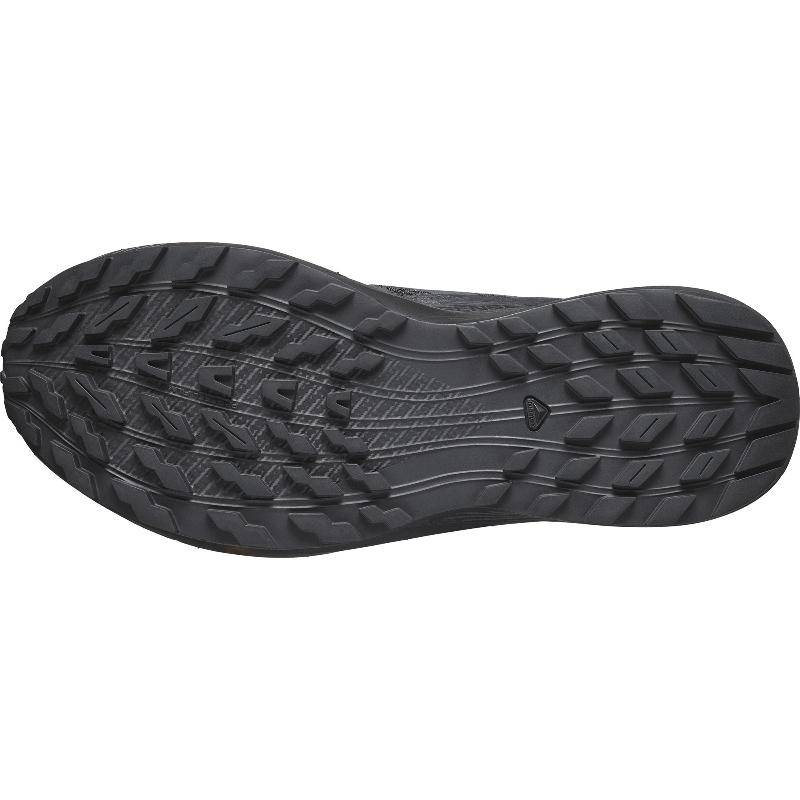 Bottom sole view of the Salomon Trail Running Shoe in India Ink (Navy Blue) showing the aggressive traction lugs and durable ASTM F3445-rated slip-resistant rubber outsole. Designed for tactical operators, law enforcement, and EMS professionals who need dependable grip on wet floors, trails, and rugged terrain. Lightweight hybrid duty and trail shoe engineered for all-day movement, comfort, and control.