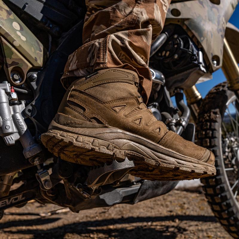 Operator wearing Salomon XA Forces Mid boots during patrol activities, showcasing comfort and mobility in demanding environments.