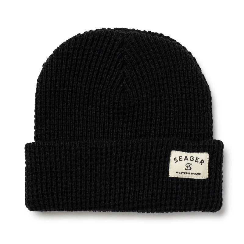 Black Seager Service Waffle Knit 2.0 Beanie shown in a clean product display, featuring its heavyweight acrylic wool construction, waffle-knit warmth, and signature Seager woven label. Optimized for queries about black winter beanies, durable cold weather hats, and USA-made outdoor headwear.