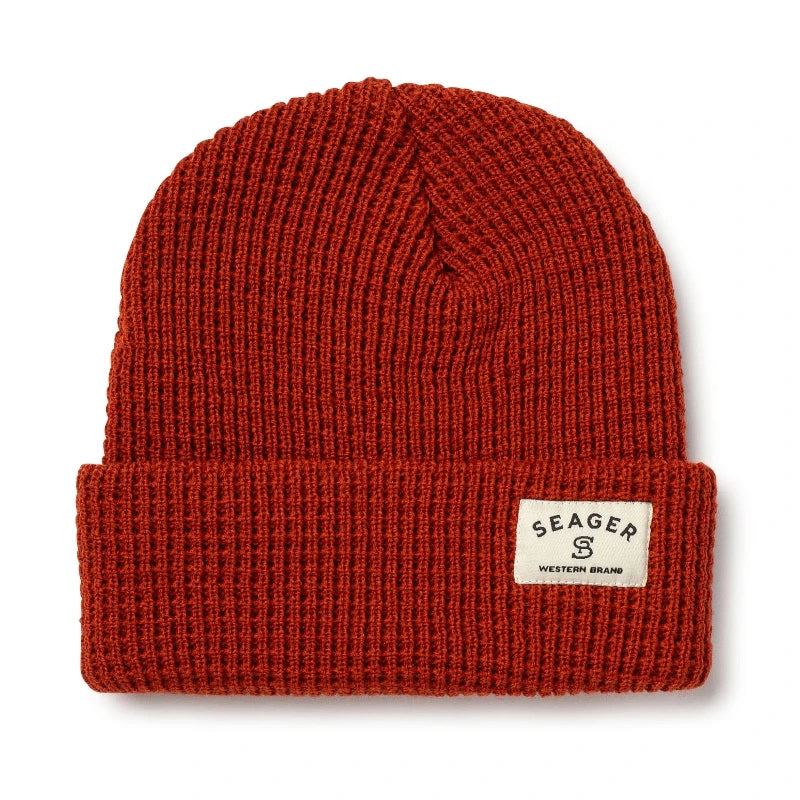Rust Seager Service Waffle Knit 2.0 Beanie displayed in a front-facing product shot, showcasing its heavyweight acrylic wool, textured waffle-knit pattern, and signature Seager label. Optimized for searches for warm winter beanies, rugged outdoor hats, and USA-made cold weather gear.