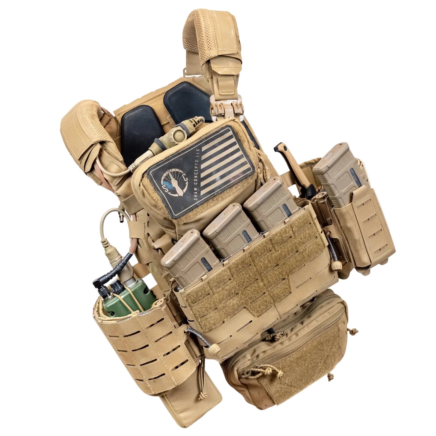 Shaw Concepts ARC Placard V4 installed on a fully kitted plate carrier, expandable modular front panel with shock cord retention and PALS webbing supporting scalable magazine storage and mission adaptable tactical loadouts for military, law enforcement, and professional range use made in the USA