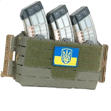 Shaw Concepts ARC Placard V4 in Ranger Green shown with multiple magazine configurations, expandable plate carrier placard with shock cord retention, loop lined interior for insert systems, and PALS webbing for adaptable tactical loadouts and scalable duty carrier builds made in the USA