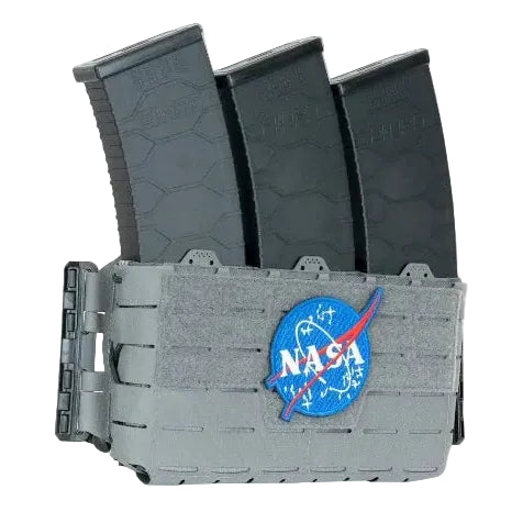 Shaw Concepts ARC Placard V4 in Wolf Grey displayed with multiple magazine configurations, expandable modular plate carrier placard featuring adjustable shock cord retention, hook backing for carrier attachment, and full PALS webbing grid for customizable tactical loadouts and professional duty gear builds made in the USA