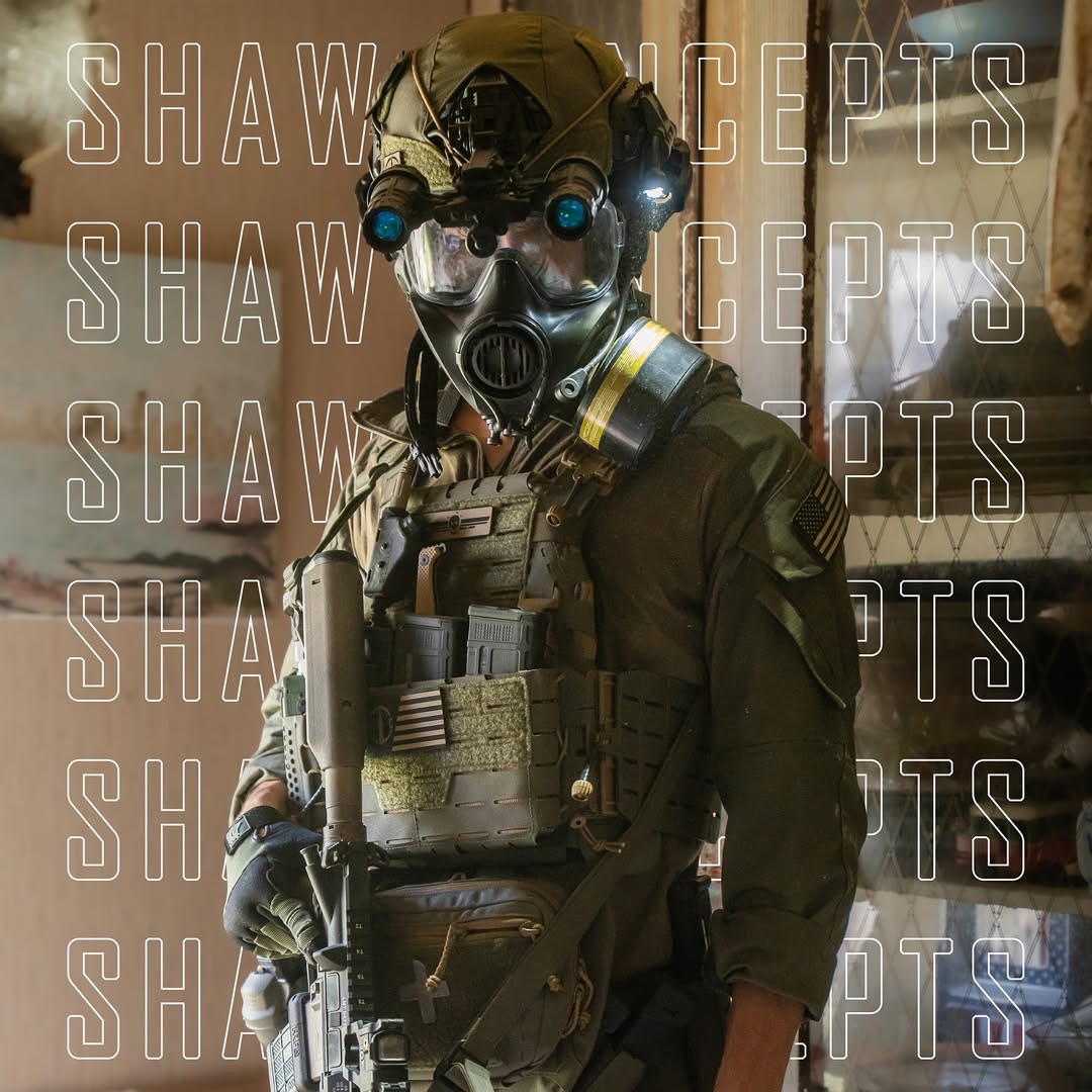 Shaw Concepts ARC Placard V4 worn on plate carrier in fully kitted tactical setup, expandable modular front panel with shock cord retention and PALS webbing supporting scalable magazine storage and mission ready military or law enforcement loadouts made in the USA