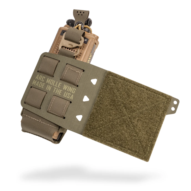 A ranger green tactical quick-release wing clip with 'ARC MOLLE WING MADE IN THE USA' printed on the side, attached to a tan radio mount and shown against a white background.