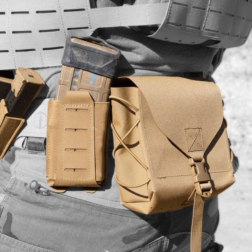 Shaw Concepts BFG Pouch mounted on a tactical belt setup carrying belt fed ammunition and heavy utility gear, MOLLE compatible machine gun ammo pouch integrated into a combat ready load bearing system