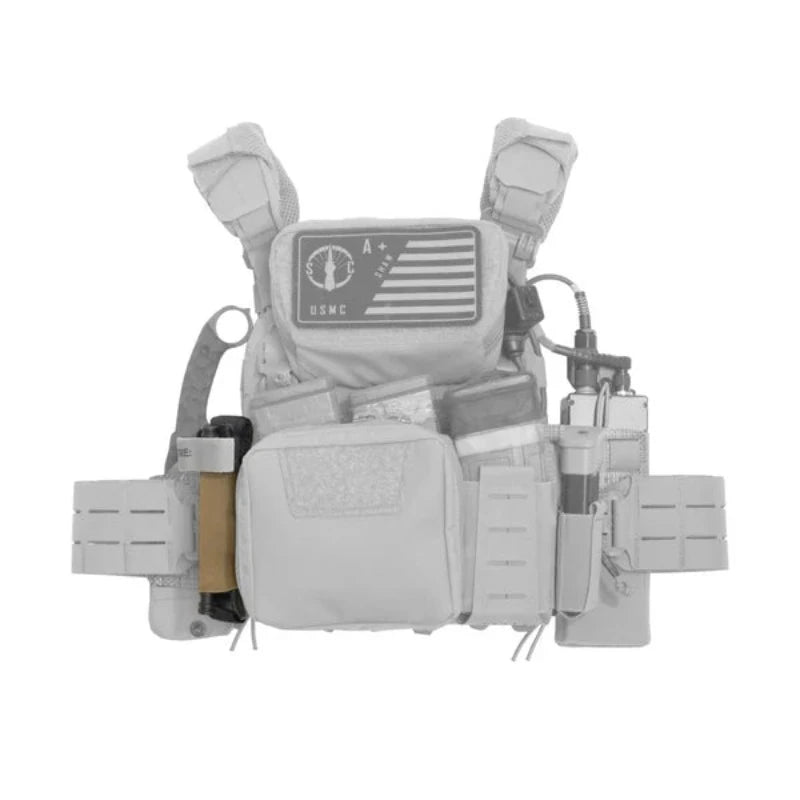 Shaw Concepts Elastic TQ Add On Pouch mounted on plate carrier as part of tactical kit, low profile MOLLE tourniquet holder securing CAT TQ on combat gear, military loadouts, and law enforcement duty setups for rapid medical access made in the USA