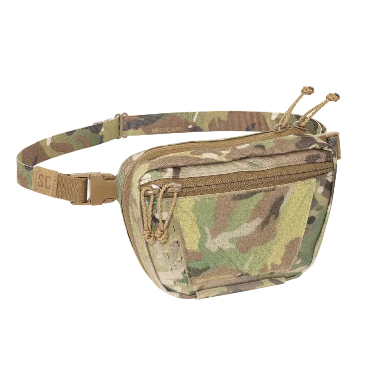 Shaw Concepts RAID Pouch V3 in Multicam configured as fanny pack with detachable First Spear Tube system, modular drop down medical and utility pouch for plate carriers and chest rigs built for IFAK setups, combat gear loadouts, and law enforcement duty applications made in the USA