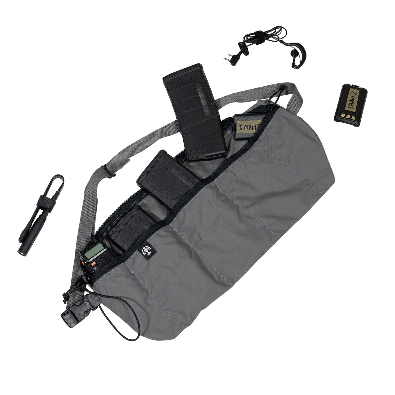 Shaw Concepts ReUp Bandolier in Wolf Grey loaded with rifle magazines, modular ammo bandolier with crossbody carry and utility pockets for 5.56 magazine storage, combat gear setups, range training kits, vehicle staging loadouts, and law enforcement duty applications made in the USA
