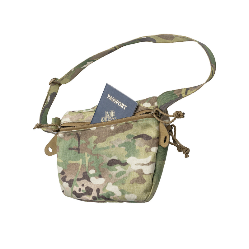 Spiritus Systems BIG Fanny SACK in Multicam with adjustable shoulder strap and rear zippered pocket holding a passport