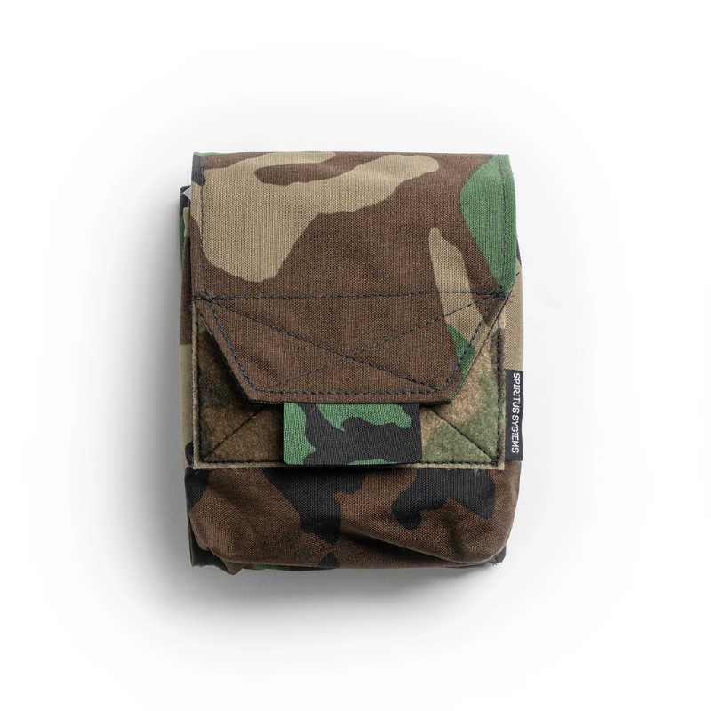 Spiritus Systems JSTA Pouch in Woodland camouflage with hook-and-loop flap closure and low-profile construction for tactical belt or MOLLE setups.