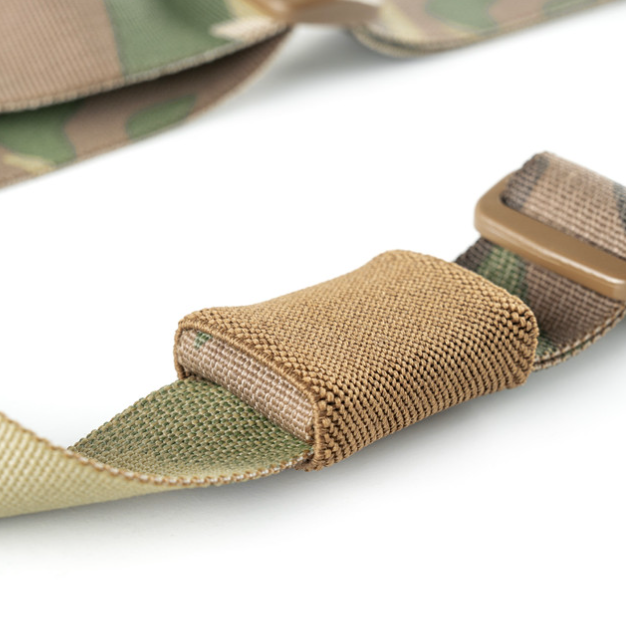 Close-up of the Spiritus Systems Elastic Strap Keeper securing folded webbing in place on a tactical strap. Elastic loop eliminates loose strap tails and keeps Spiritus gear tight and squared away.