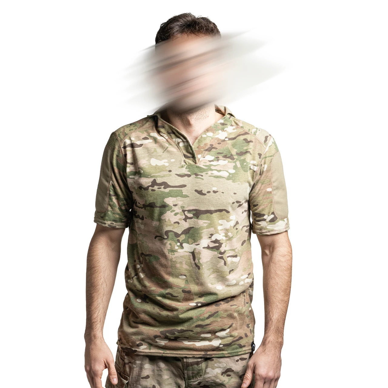 Front view of a model wearing the Spiritus Systems Mission Rugby Shirt Short Sleeve in MultiCam, showcasing the fit and tactical performance design.