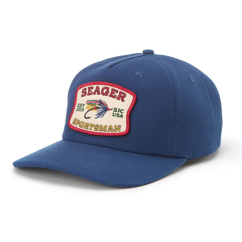 Blue cap with Seager Sportsman patch on a white background