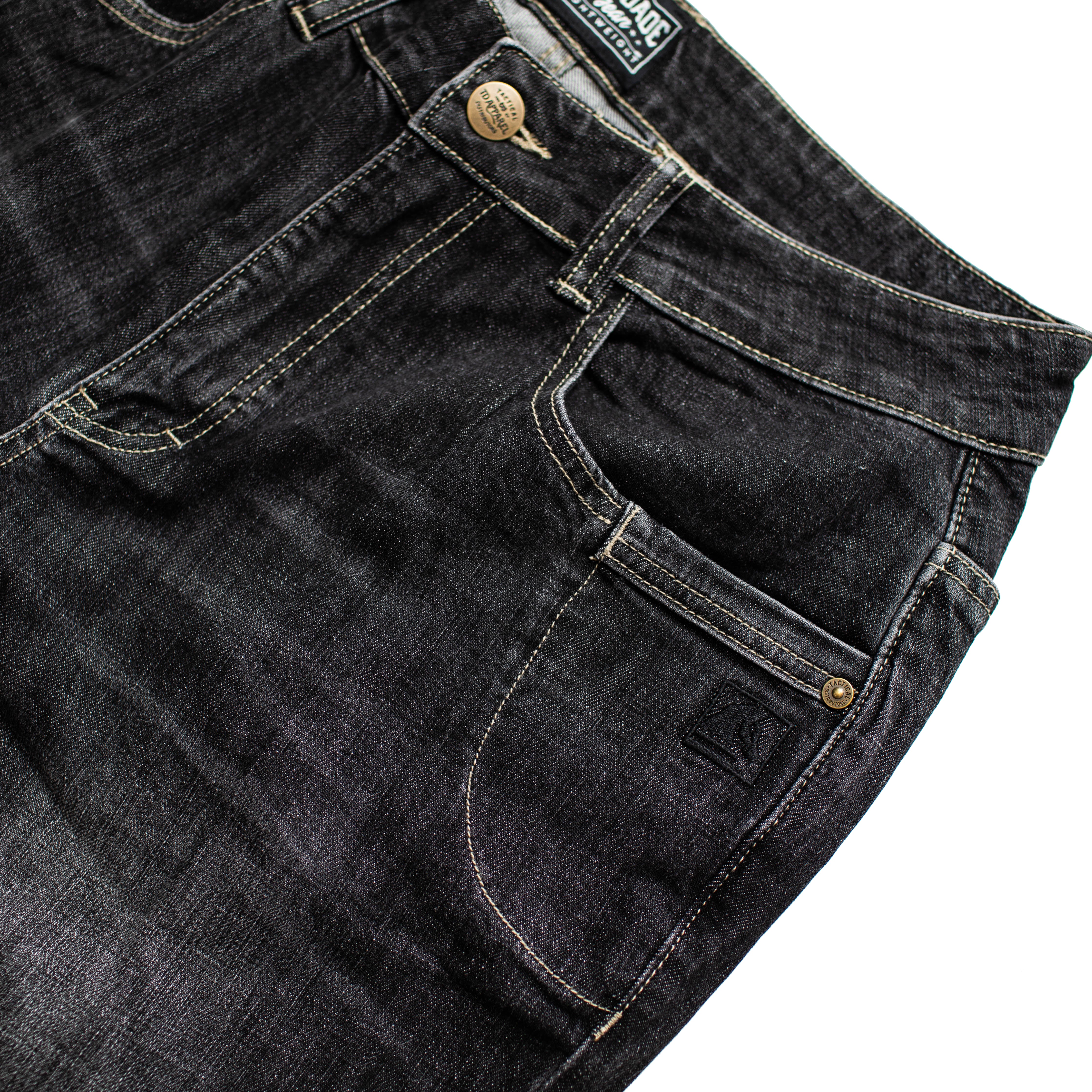 Close up of the TD McQuade Tactical Jeans in the Vintage Black wash showing the front pocket detail, reinforced stitching, knife pocket placement, and concealed carry friendly EDC layout designed for users searching for the best tactical jeans, CCW denim, and everyday carry pants.