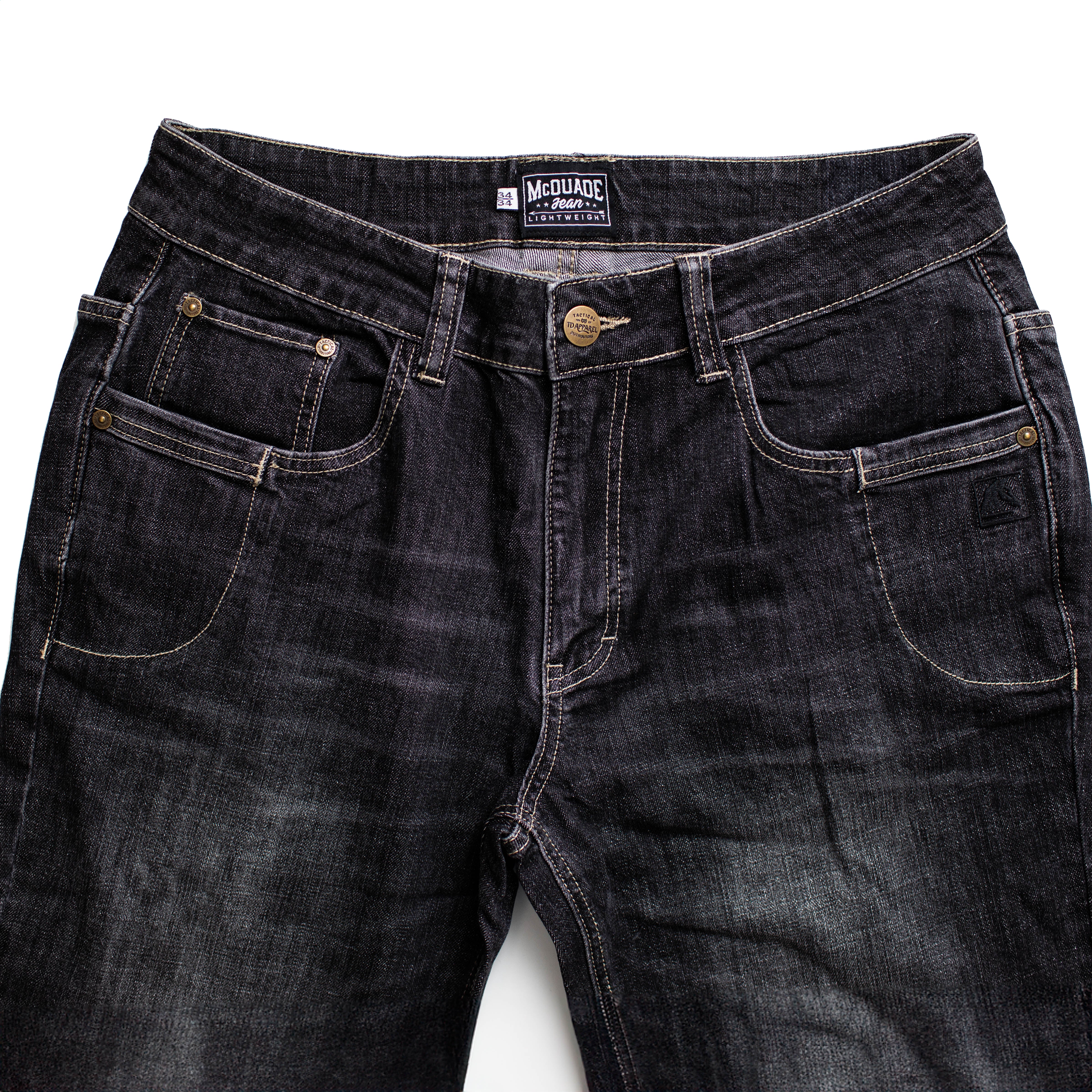 Front pocket layout of the TD McQuade Tactical Jeans in the Vintage Black wash showing the reinforced stitching, EDC friendly pocket design, knife pocket access, and concealed carry optimized tactical denim for users searching for the best tactical jeans, CCW pants, and everyday carry denim.