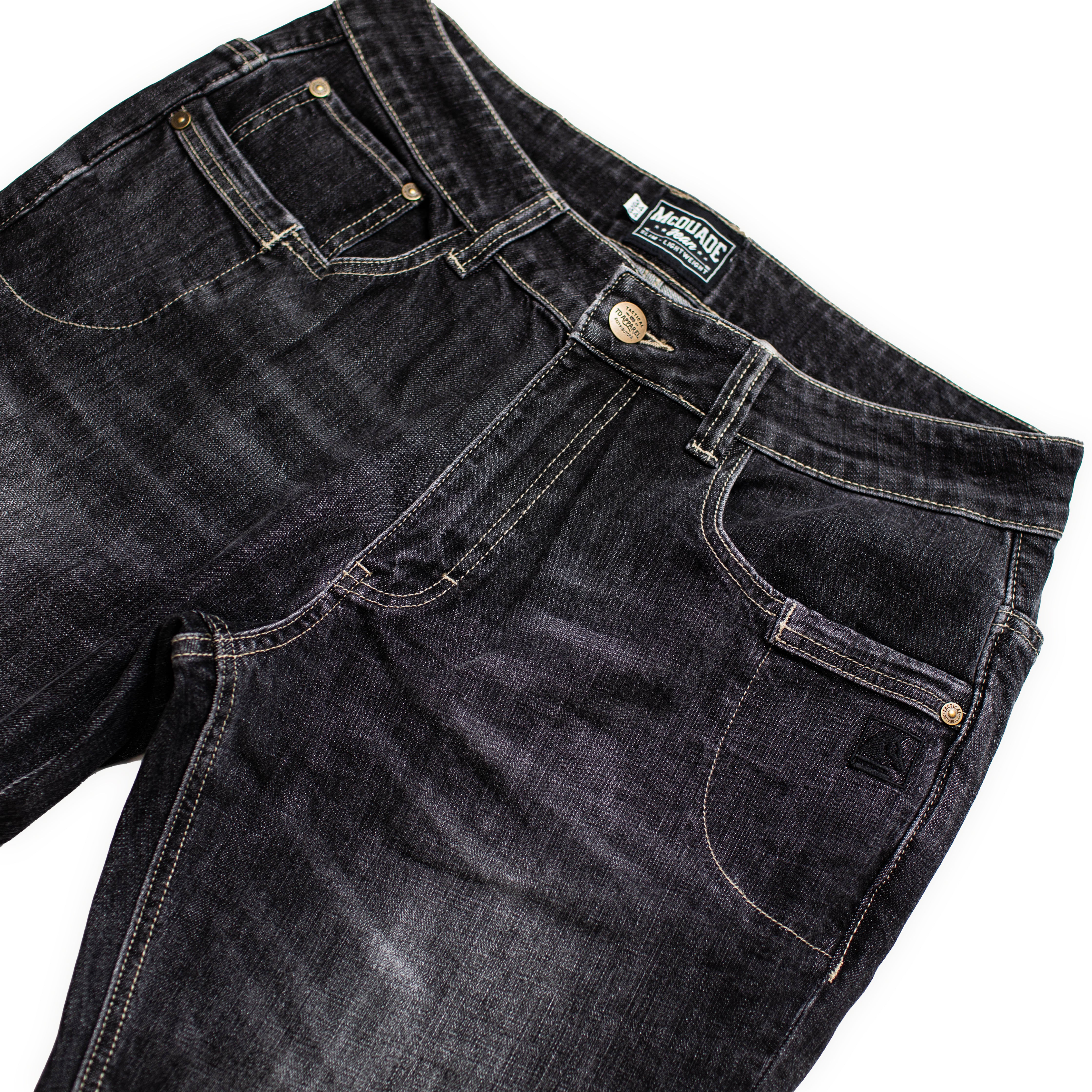Front pocket layout of the TD McQuade Tactical Jeans in the Vintage Black slim cut showing the discreet EDC pocket design, reinforced stitching, knife pocket access, and low profile tactical features that maintain a non obvious everyday denim appearance for users searching for the best tactical jeans, CCW pants, and everyday carry denim.