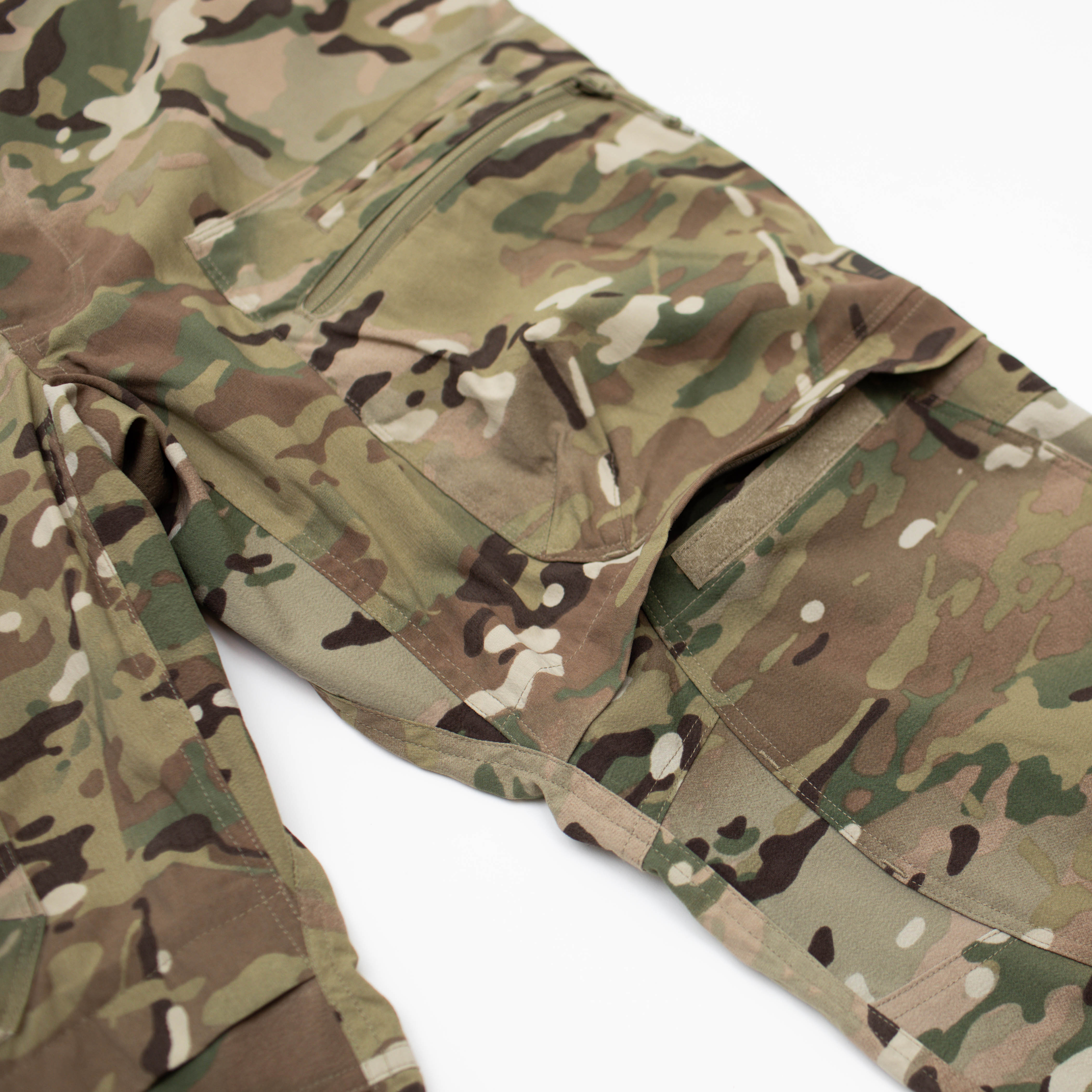 Close-up of TD Cordell Amphib Combat Pants V2 in MultiCam® Agility showing knee pad insert pocket and articulated knee design. Amphibious tactical pants engineered for mobility, protection, and compatibility with removable kneepads. Built with Brookwood quick-dry, abrasion-resistant fabric for range training and field deployments.
