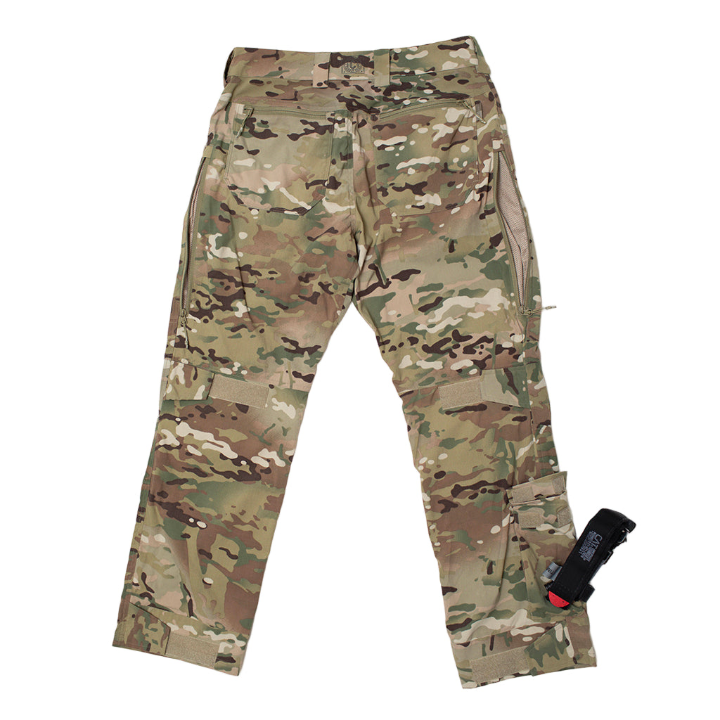 Full back view of TD Cordell Amphib Combat Pants V2 in MultiCam® Agility showing ergonomic cut, reinforced back pockets, improved leg adjustments, and ankle cargo pocket for tourniquet storage. Amphibious tactical pants built with Brookwood quick-dry fabric for EDC, range training, outdoor use, and tactical deployments.