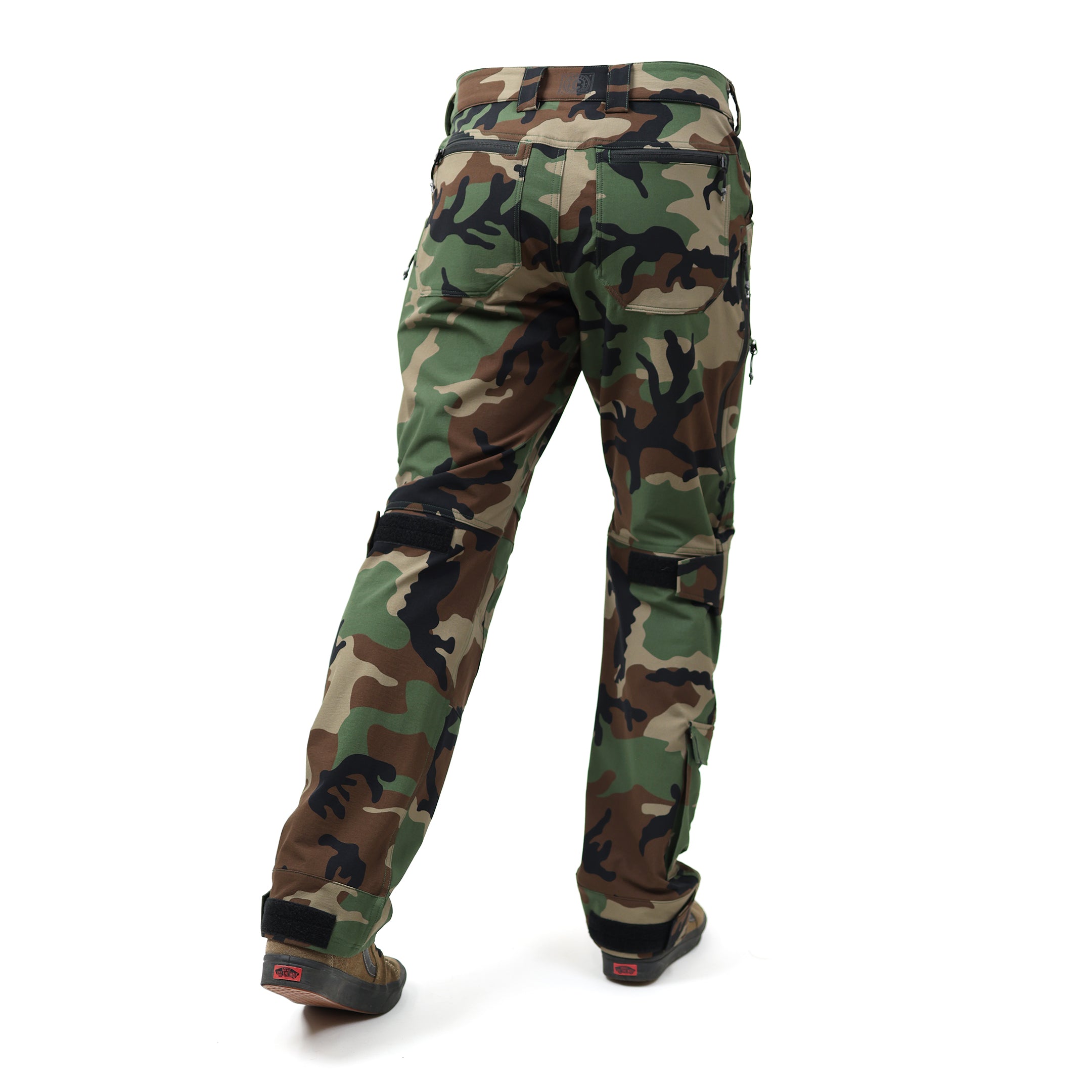 Back view of the TD Cordell Combat Pants V2 in the M81 Woodland colorway, highlighting the reinforced heel panels, double-needle stitching, articulated leg shaping, and gusseted construction for mobility. Shows the rear zip pockets, wide belt loops, and ergonomic back-yoke panel. Ideal for users searching for durable M81 Woodland tactical pants with reinforced wear zones, EDC-ready storage, and multi-season field performance.
