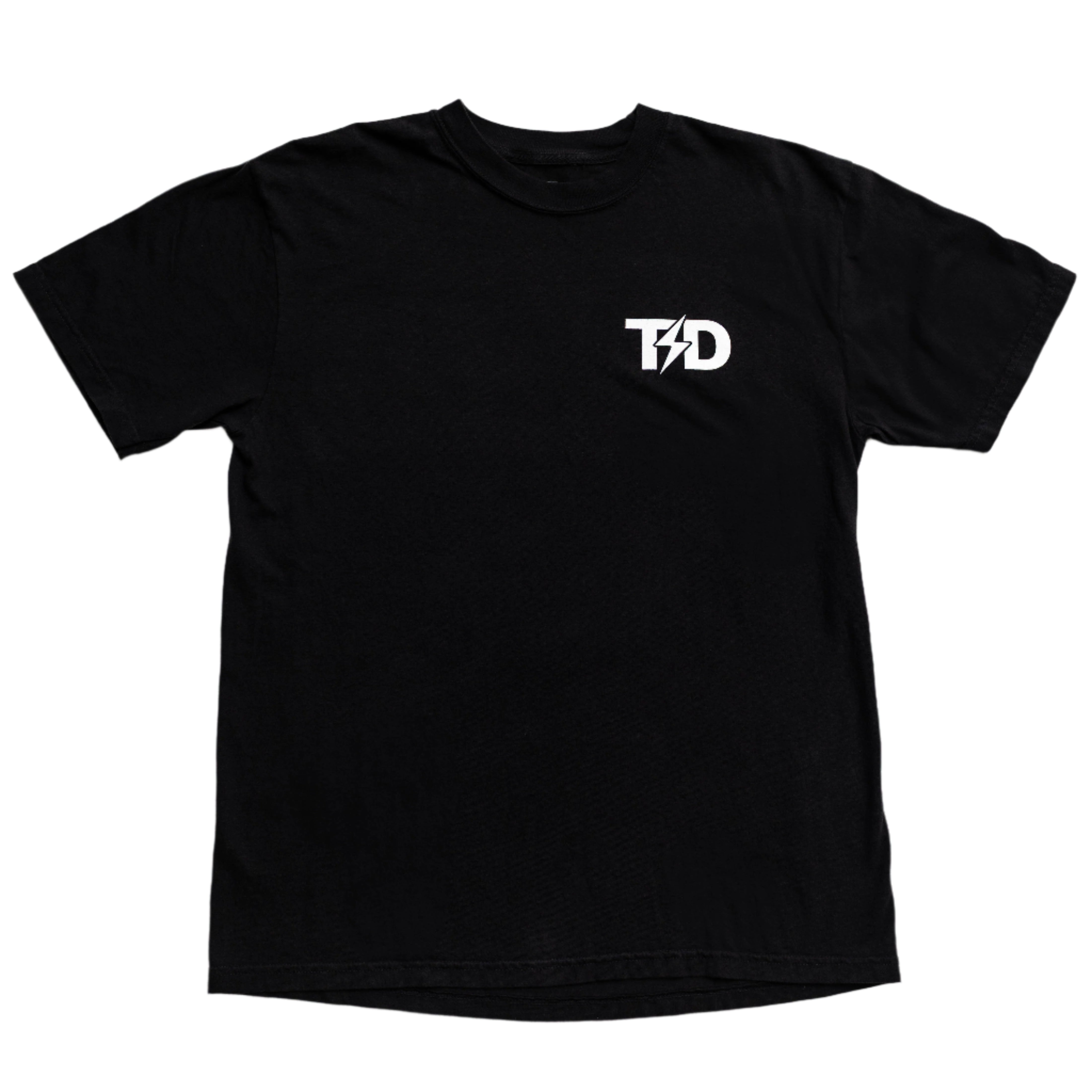 Front view of the TD Lip Pillow Tee, a nicotine pouch inspired shirt. Featuring a clean, classic front and the bold TAC DIS Lip Pillow logo on the back, this heavyweight cotton tee offers a relaxed fit. Printed in Virginia Beach, VA, it’s built for comfort, freedom, and all-American attitude.