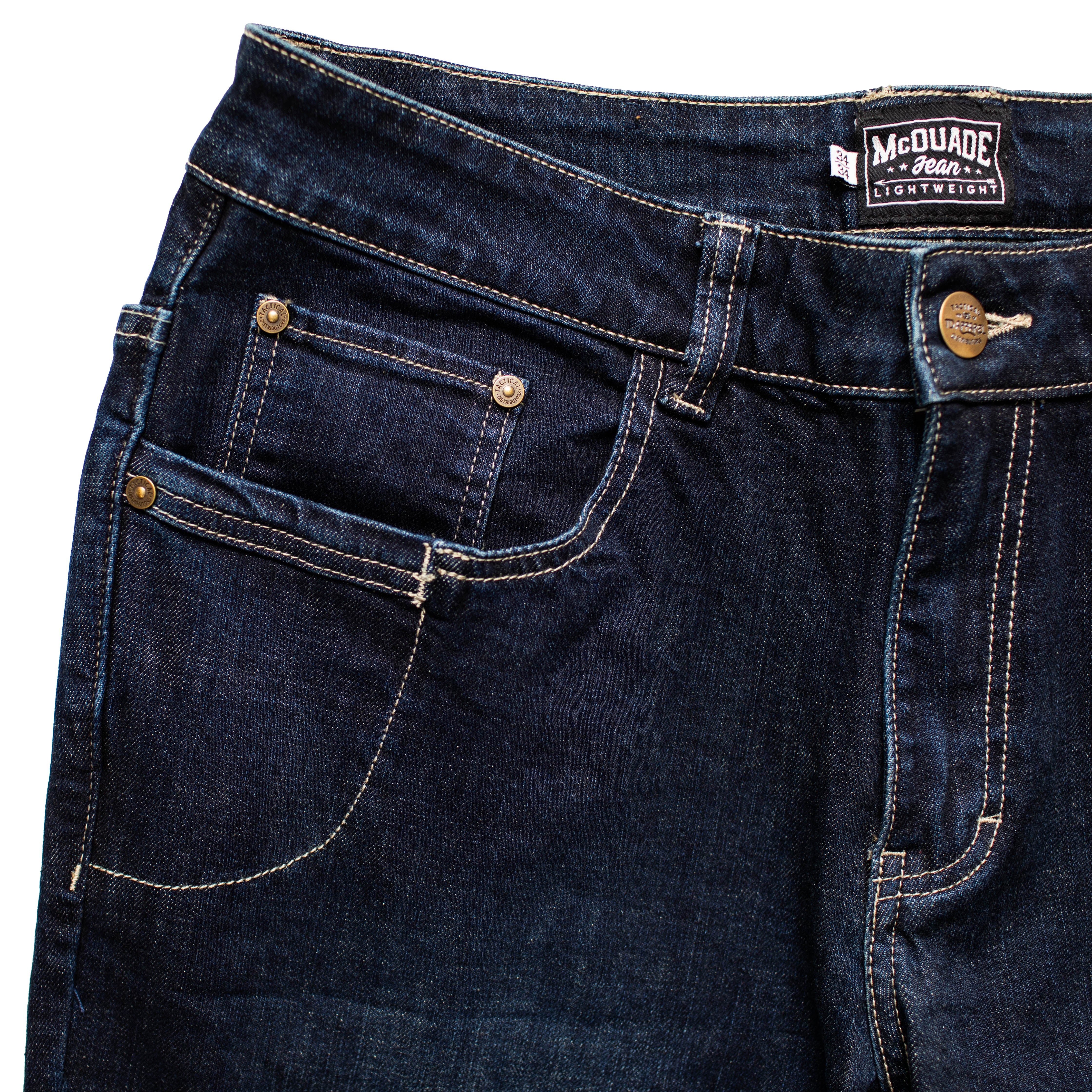 Close view of the TD McQuade Tactical Jeans waistband and front pocket layout showing the reinforced belt loops, CCW friendly design, and EDC optimized pockets for knives, multitools, mags, and everyday tactical gear.