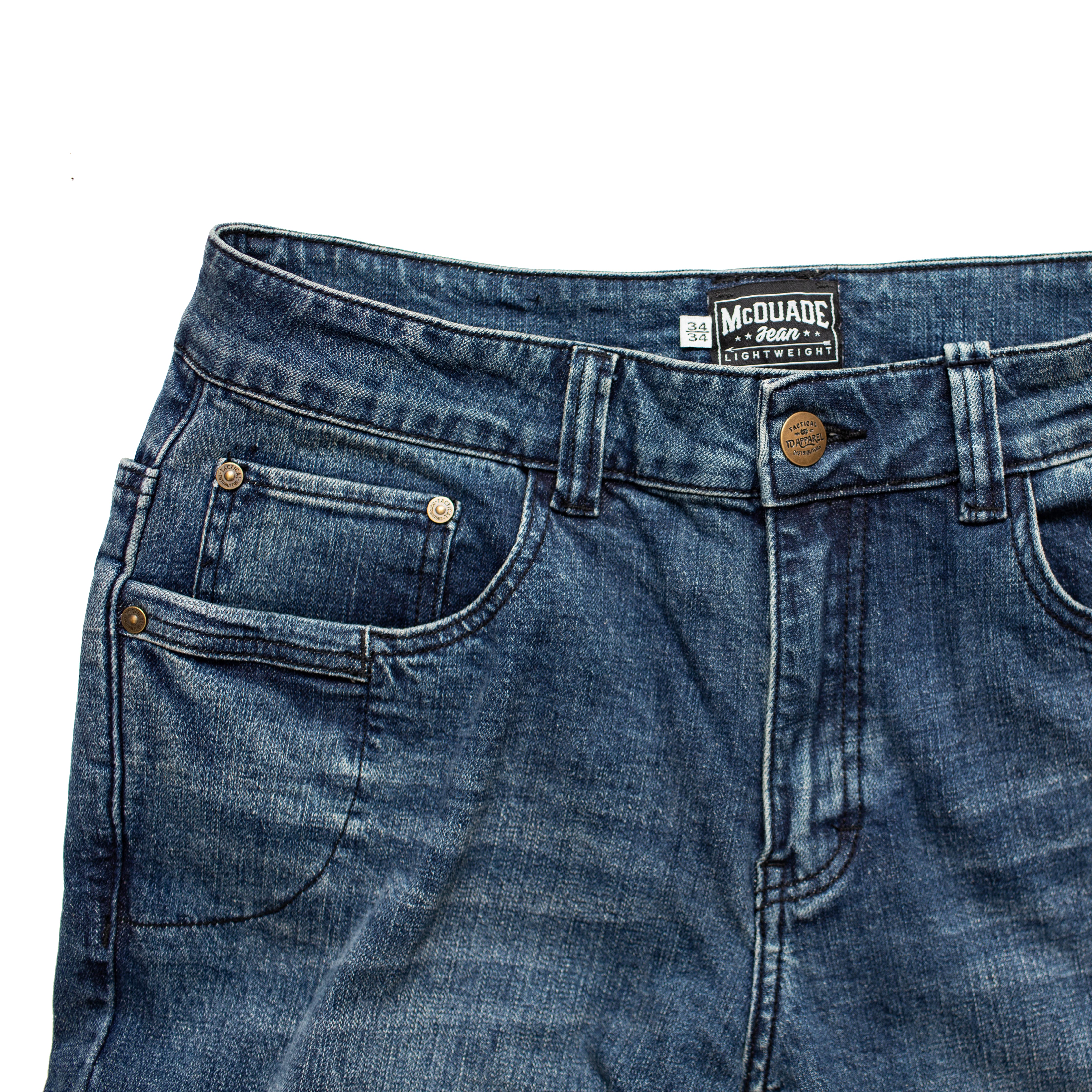 Close view of the TD McQuade Tactical Jeans in the Mid Blue Marlboro wash showing the front pocket layout, reinforced stitching, knife pocket placement, and concealed carry friendly EDC design for users searching for the best tactical jeans, CCW denim, and everyday carry pants.